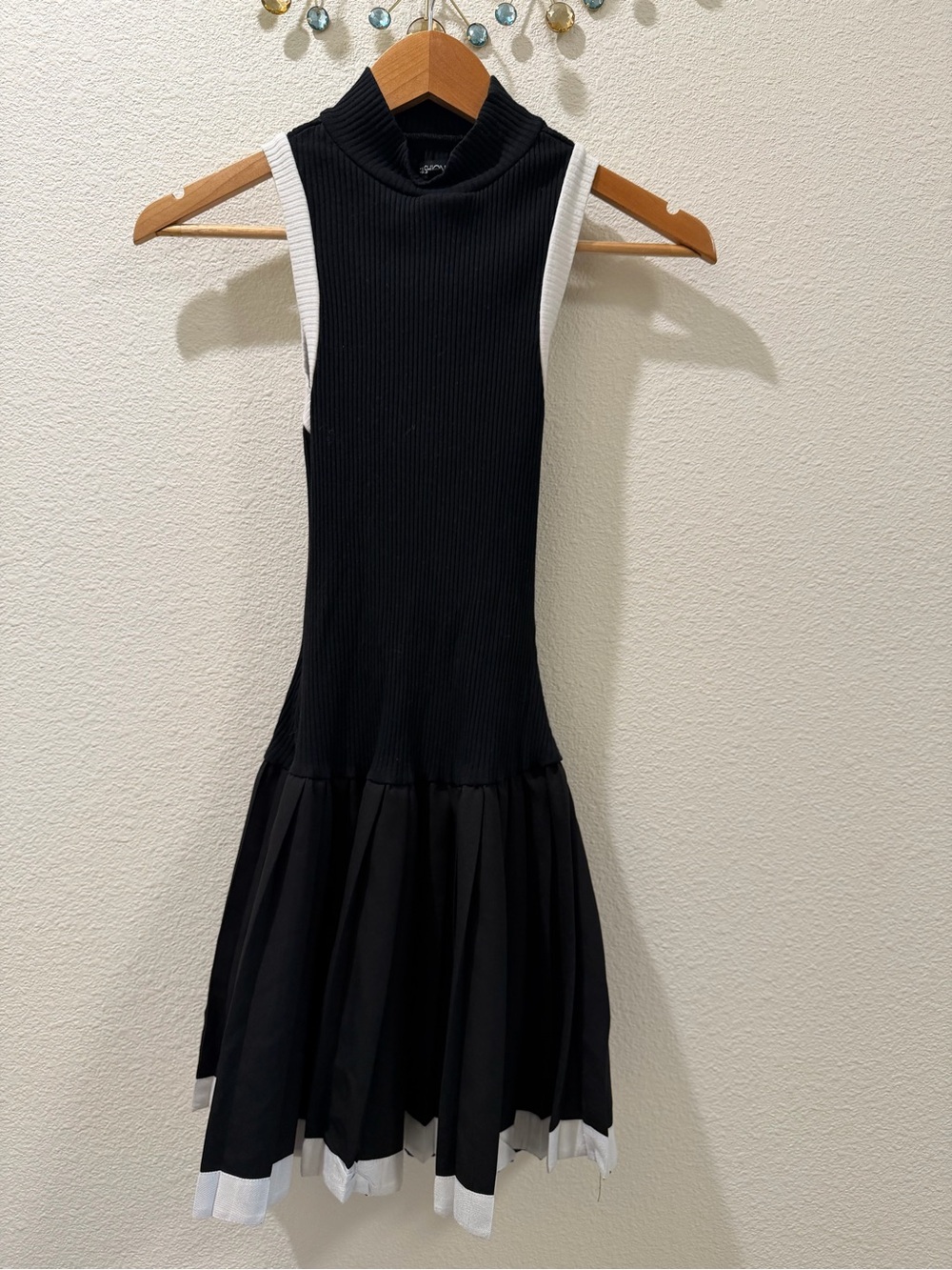 Fashion Nova Black & White Mock Neck Sleeveless Midi Dress, bottom is flare.